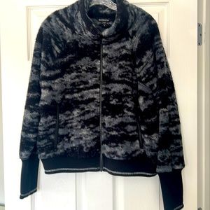 Like new Athleta grey/black fleece full zip jacket. Size XL.